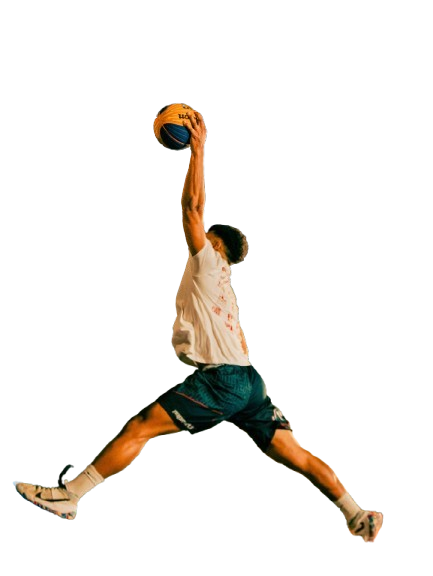 black and white image of a player about to dunk a basketball
